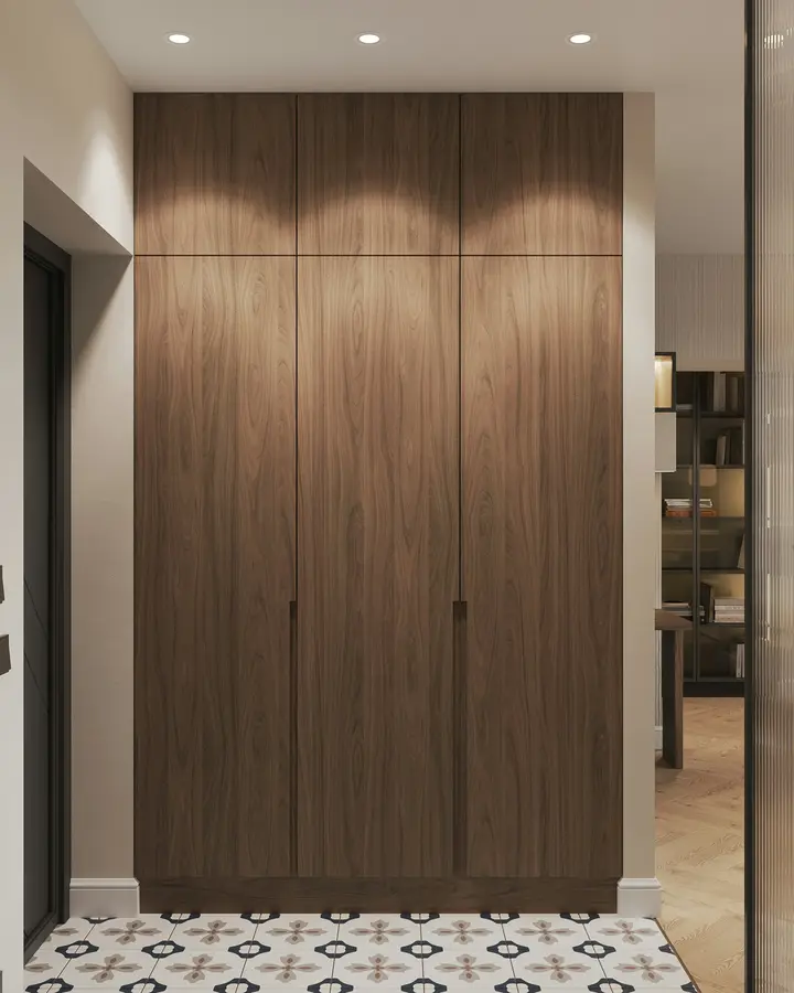 Floor-to-ceiling walnut veneer hallway cupboards